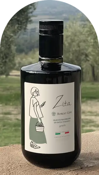 Bottiglia di olio Zita tra gli ulivi di Borgo Gini